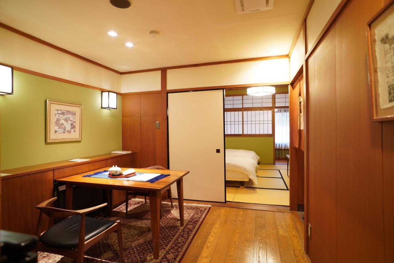 Hotel Arima Onsen Tocen Goshobo Kōbe Exterior foto A room at a ryokan