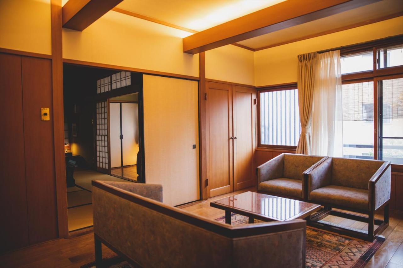 Hotel Arima Onsen Tocen Goshobo Kōbe Habitación foto A room at the hotel